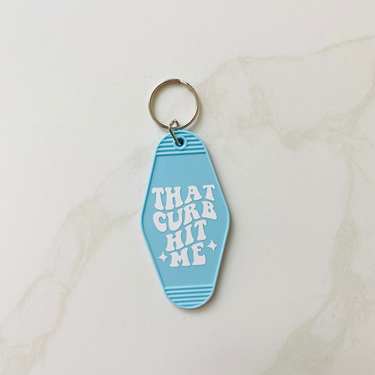 That Curb Hit Me Motel Keychain with Tassel